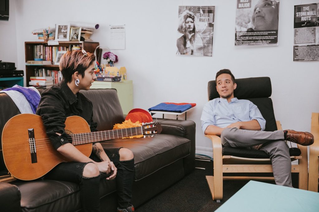 Adults sitting in office