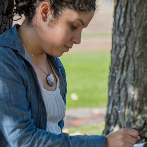 Woman sitting in park